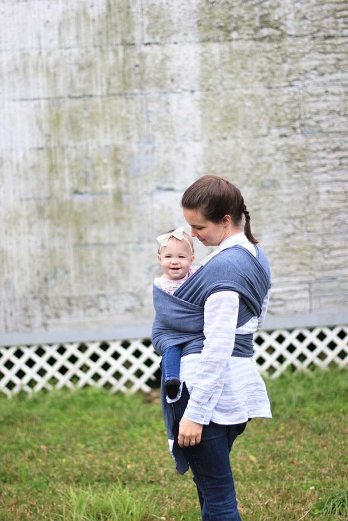 babywearing in a wrap style carrier - how to and the benefits of touching your baby