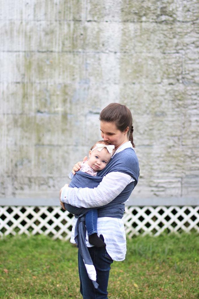 snuggling baby and mama wearing a moby baby wrap