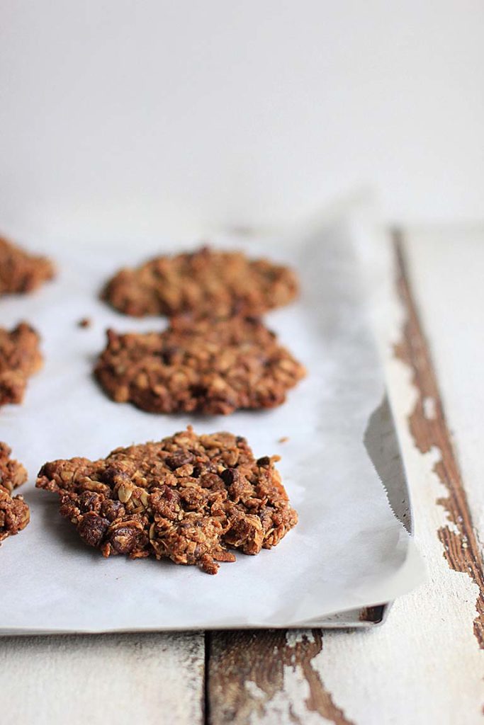 healthy lactation cookies on a sheet pan with parchment paper