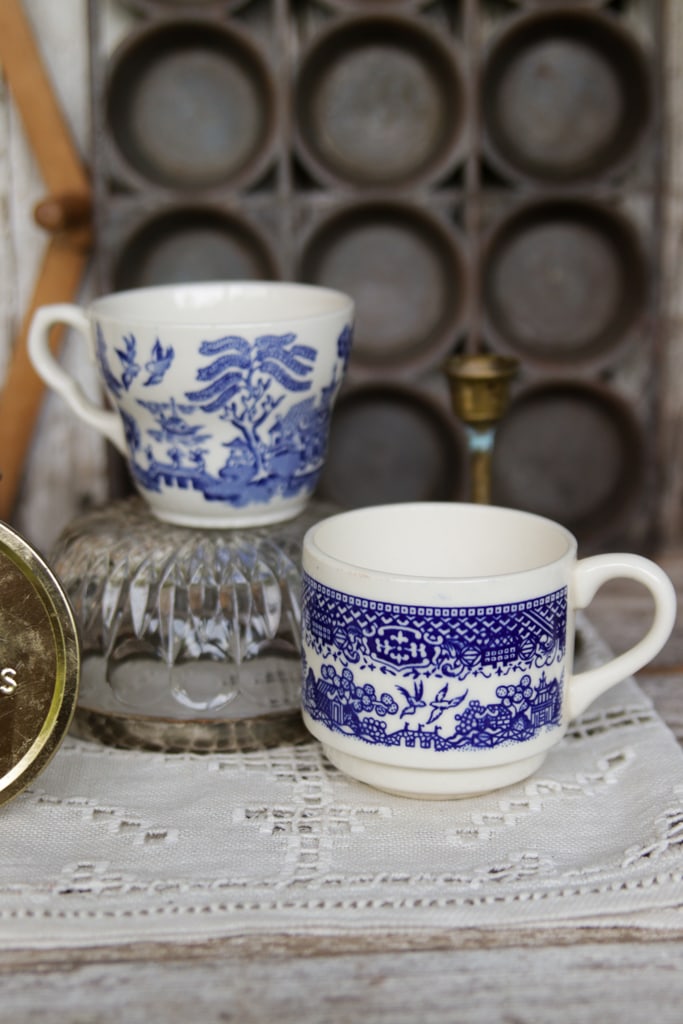 blue and white willow cups in a vintage vignetter