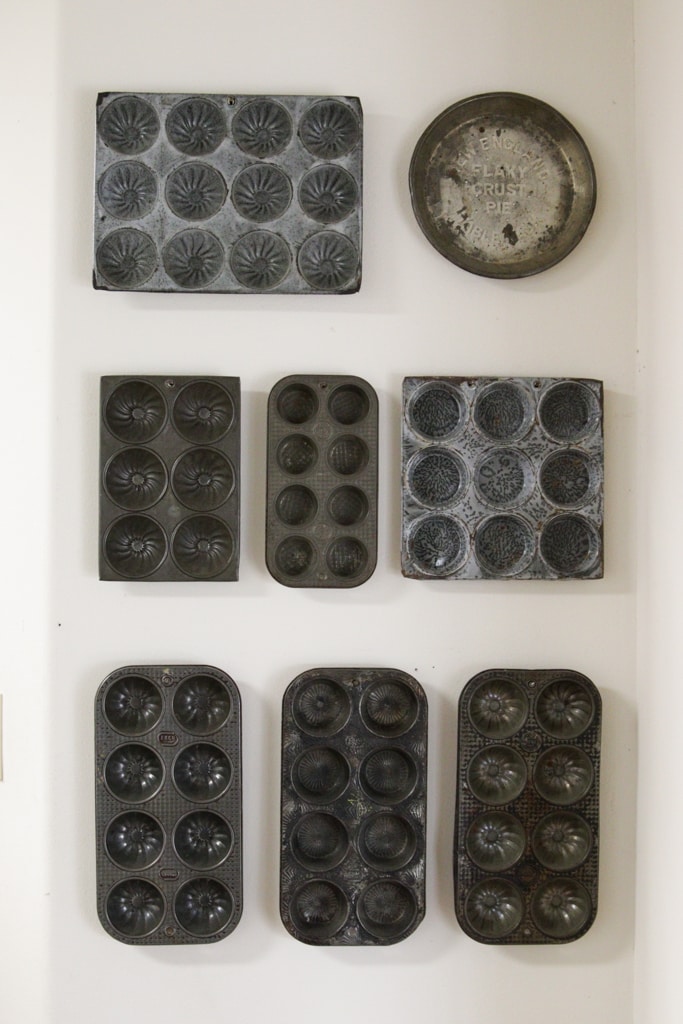 gallery wall display of vintage muffin pans
