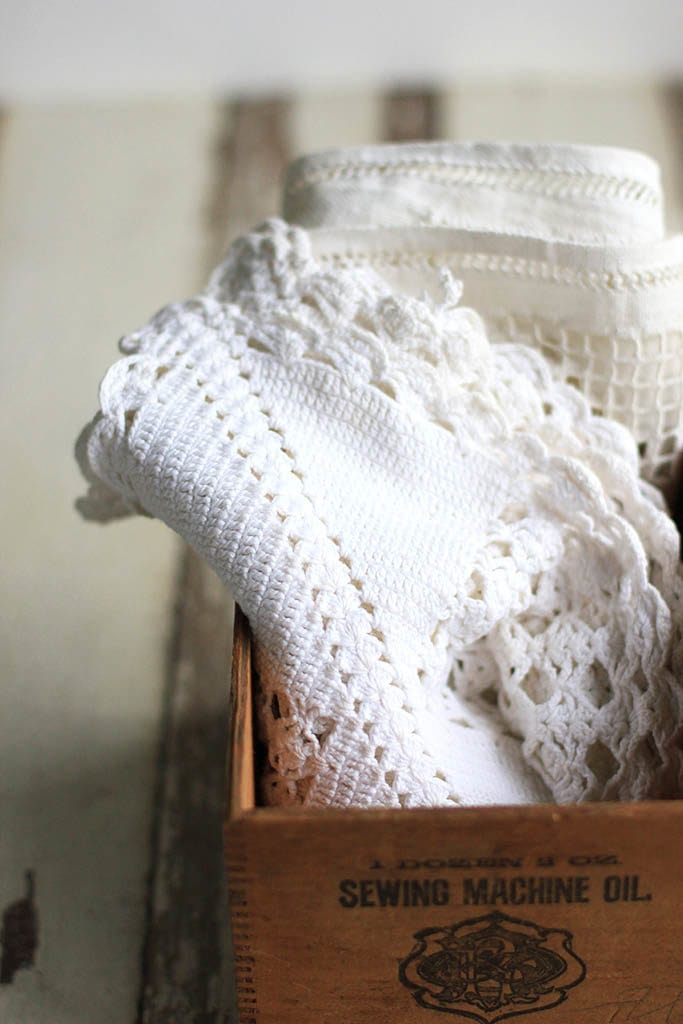 vintage crocheted linens in an antique box with dovetail corners