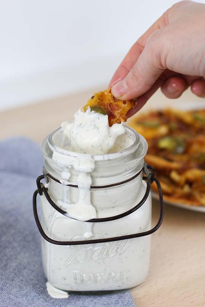 bacon and cheese french fries dipped in homemade ranch dressing