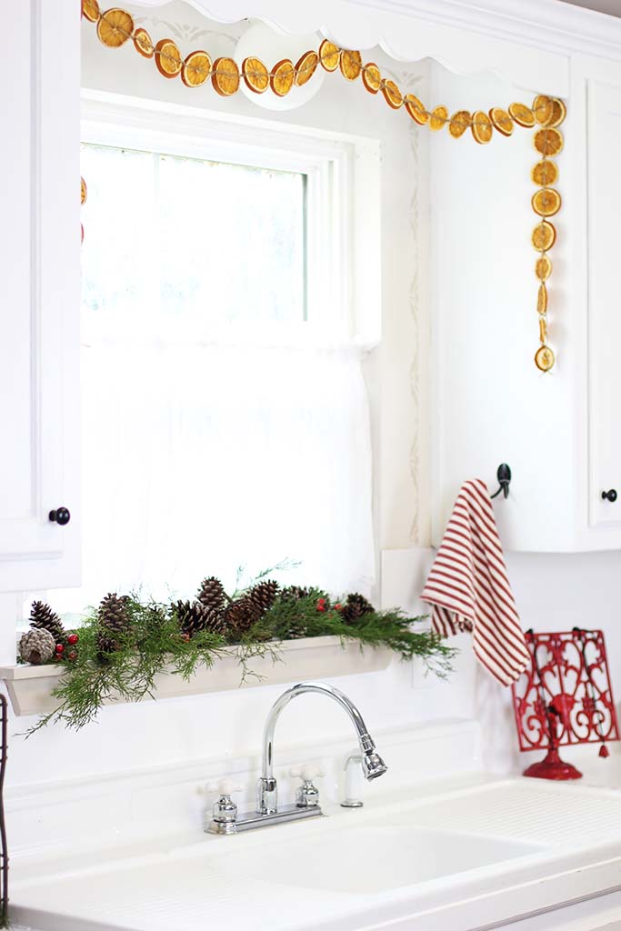White farmhouse kitchen with simple Scandinavian style decor.