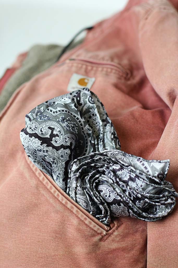 silk scarf wild rag in a carhartt jacket pocket